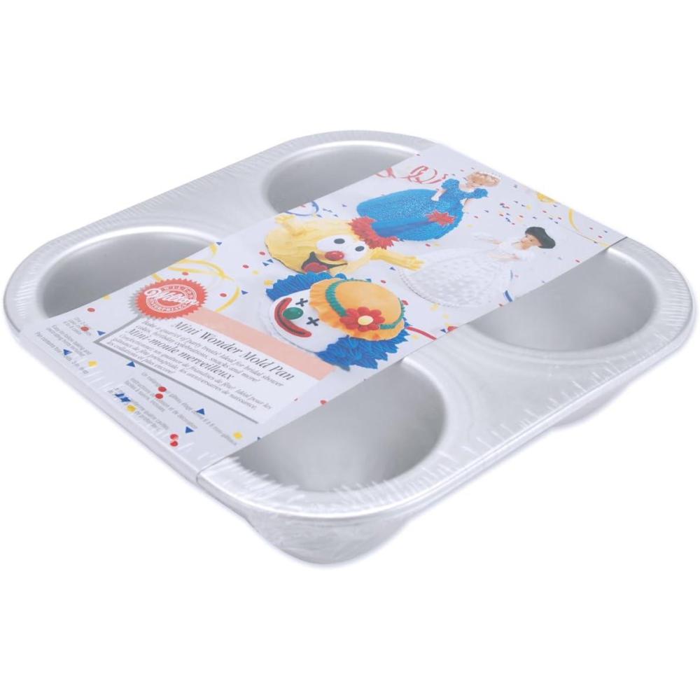 image:imageWilton Classic Wonder Mold Cake Pan Aluminum Shaped Bakeware for Doll Cakes Durable Even Heating RustResistant Includes Heating Rod Packaging May VaryWonder Mold 4Cavity